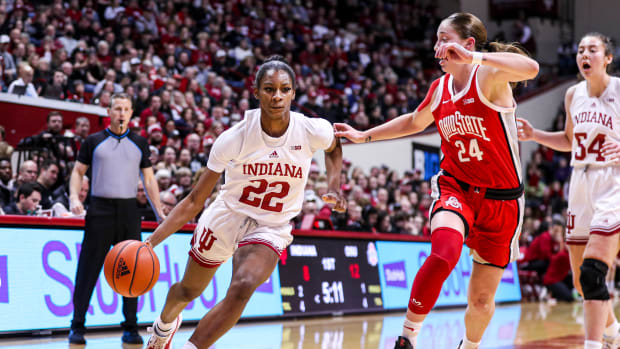 Chloe Moore-McNeil (22) dribbles past Ohio State guard Taylor Mikesell (24) in Simon Skjodt Assembly Hall on Jan. 26, 2023.